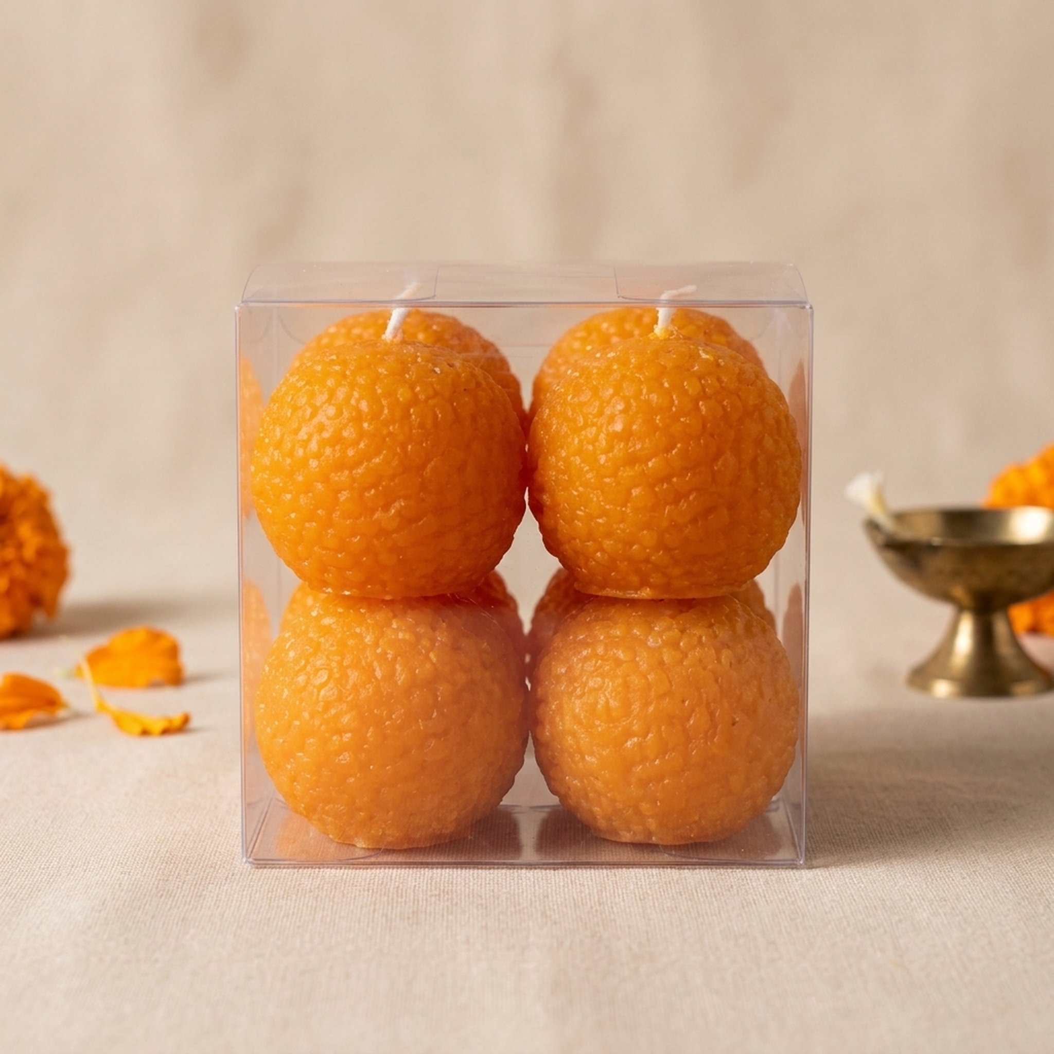 R Shanor essentials Set of Four Orange scented Ladoo Candles 2